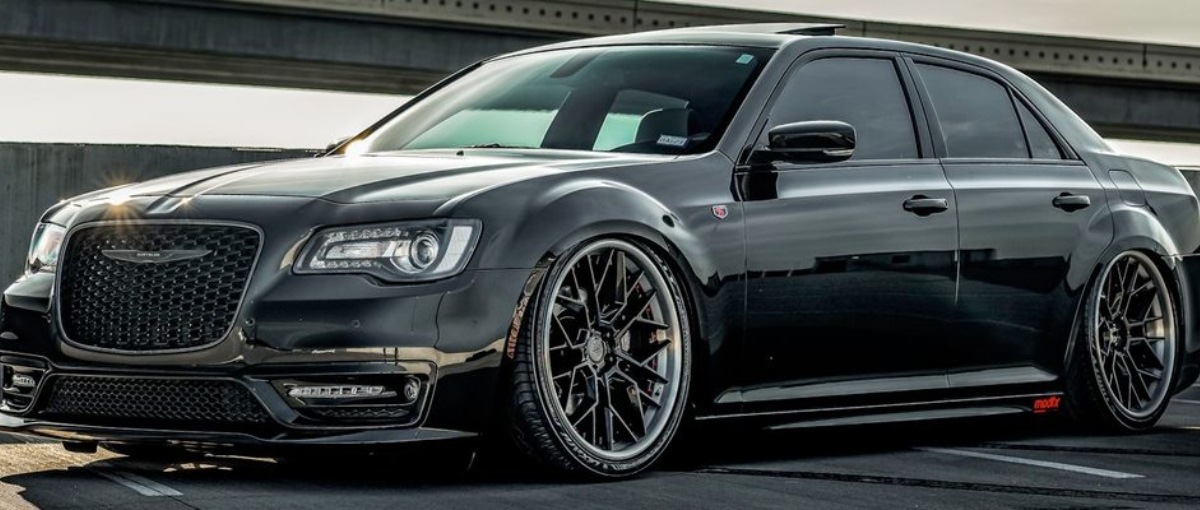 Chrysler Certified Collision Repair background Chrysler Certified Collision Repair 300 parked