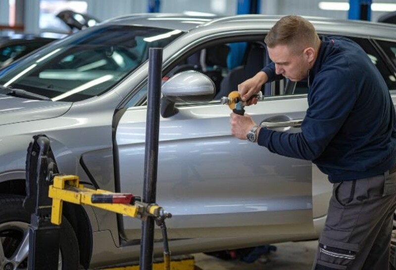 Hail Damage Repair PDR tech Hail Damage Repair PDR tech